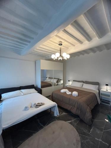 Postel nebo postele na pokoji v ubytování REALE B&b EMPOLI