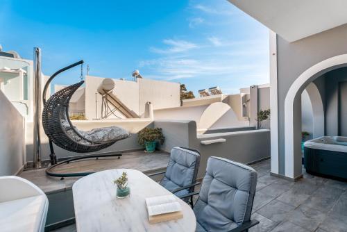 Coin salon dans l'établissement Oasis Suites Fira