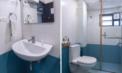 a bathroom with a sink and a toilet at Treebo Kings Orchid in Bengaluru