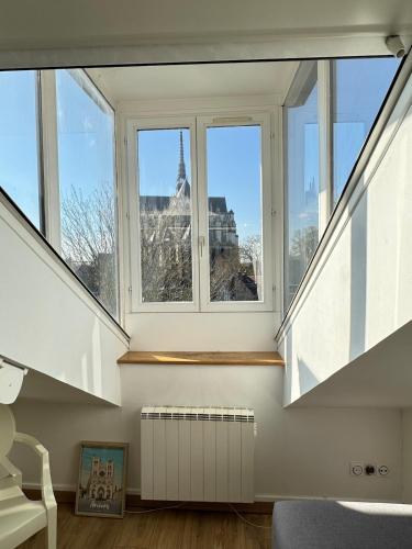 Photo de la galerie de l'établissement Hébergement exceptionnel au centre-ville, vue sur la cathédrale, à Amiens