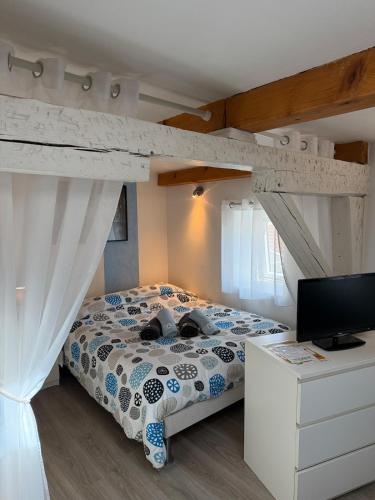 Un ou plusieurs lits dans un hébergement de l'établissement Studio confortable proche gare - Escale Belfortaine