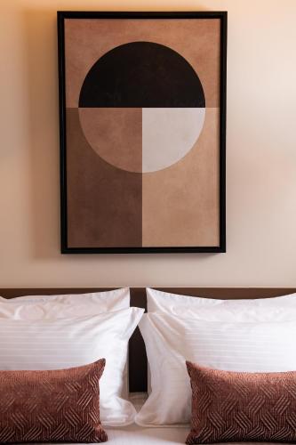 Una cama o camas en una habitación de The K Nest Hotel Nafplio