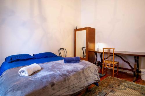 Ένα ή περισσότερα κρεβάτια σε δωμάτιο στο Il Lupo Della Sila
