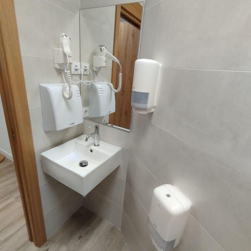 Koupelna v ubytování dpaso Urban Hostel