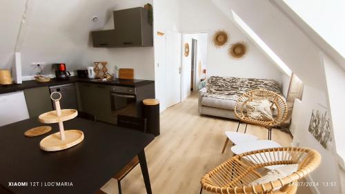 Kuchyň nebo kuchyňský kout v ubytování Le Roi de Guerveur - Appartement vue mer