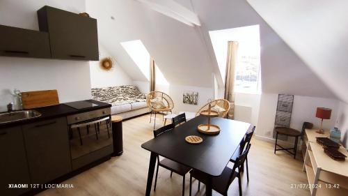 Kuchyň nebo kuchyňský kout v ubytování Le Roi de Guerveur - Appartement vue mer
