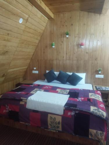 Ένα ή περισσότερα κρεβάτια σε δωμάτιο στο Green hill cottage