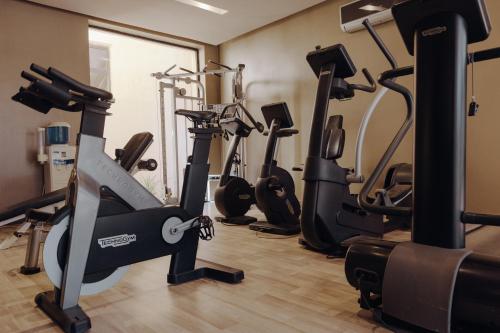 a row of exercise bikes in a gym at Sirayane Boutique Hotel & Spa Marrakech in Marrakesh