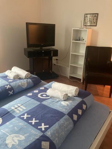 Ένα ή περισσότερα κρεβάτια σε δωμάτιο στο Ubytovanie u Marty