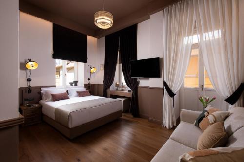 Una cama o camas en una habitación de The K Nest Hotel Nafplio