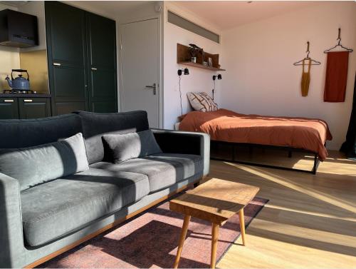 Posezení v ubytování Tinyhouse - De Esdoorn Zes
