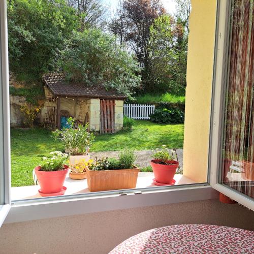 Un jardín fuera de Gite de La Pivarderie