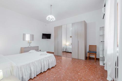 Ένα ή περισσότερα κρεβάτια σε δωμάτιο στο Appartamento Roma - La Casetta di Vale