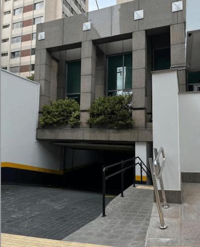 a building with plants on the side of it at HOTEL PERDIZES - FLAT Executivo - 1208 in Sao Paulo