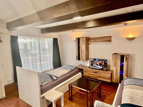Postel nebo postele na pokoji v ubytování Barrierefreies Altstadtappartement in Osterode