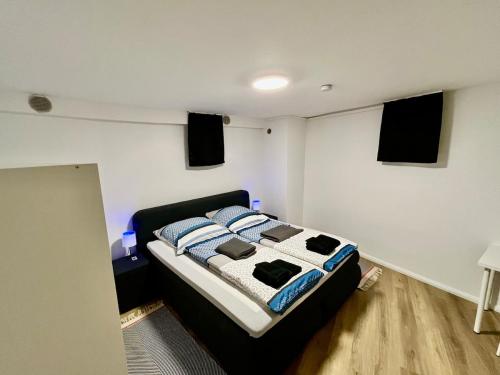Postel nebo postele na pokoji v ubytování Barrierefreies Altstadtappartement in Osterode