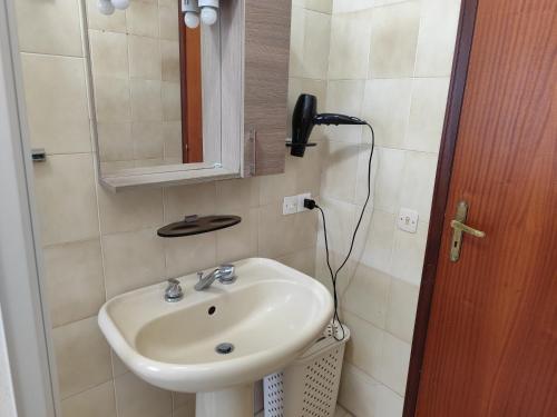 Koupelna v ubytování Casa "Sole Naxos"