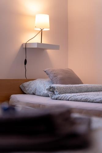 Katil atau katil-katil dalam bilik di Tisza-lak Apartmanházak