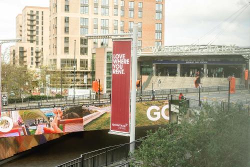 a sign that says love where your mouth is at Wembley Stadium Apartments by Sleepy Lodge London in London