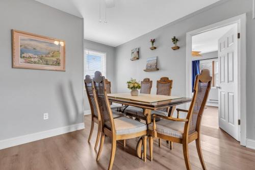 a dining room with a table and chairs at Next to Beach and Waterpark with Free Parking! in Seaside Heights