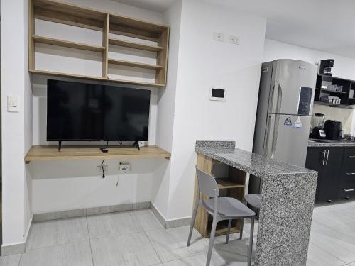 Kuchyň nebo kuchyňský kout v ubytování Apartamento en San Gil, moderno y excelente ubicación