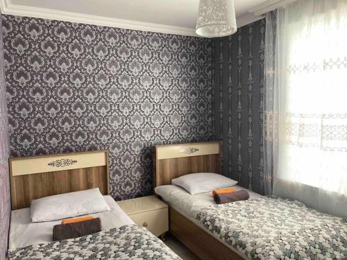 Llit o llits en una habitació de Blissful house