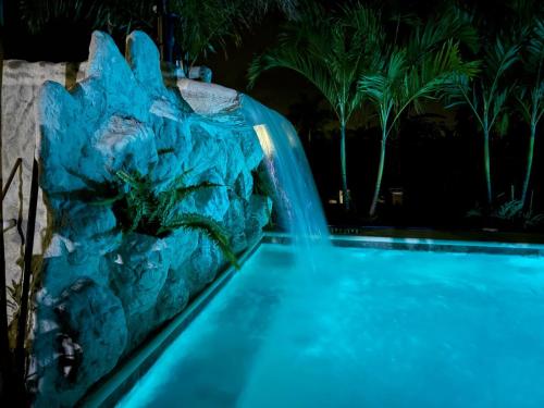 a water slide in a theme park at night at Casa tipica in Fortuna