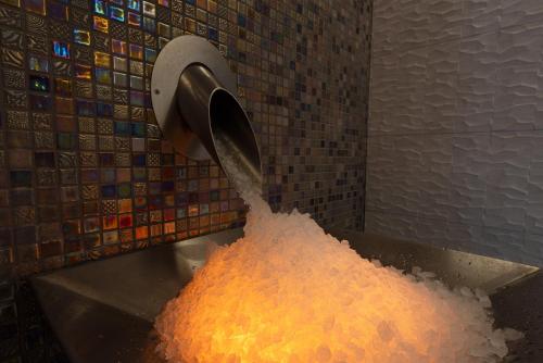 a pile of rice is being poured into a bucket at Hipotels La Geria in Puerto del Carmen