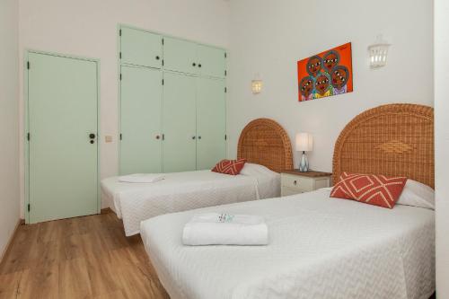 Ένα ή περισσότερα κρεβάτια σε δωμάτιο στο Beachline Apartment in Praia da Luz