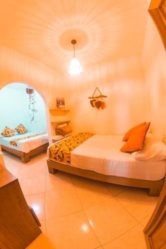 a bedroom with two beds and a window at Índigo Cowork in San Rafael