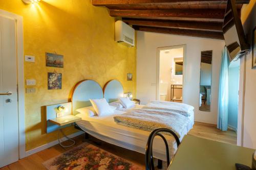 Posteľ alebo postele v izbe v ubytovaní Hotel San Filis