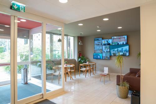 A television and/or entertainment centre at Residence Panigale