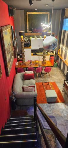 a living room with a couch and a table at Madrid Centro, Edificio Entero Solo Para Ti in Madrid
