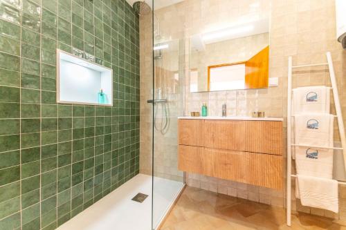 a bathroom with a shower and a sink at Refúgio da Ria By ALGARTUR in Cabanas de Tavira