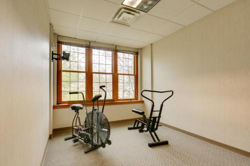 two bikes parked in a room with a window at 1 Mi to Allegheny River New Kensington Studio! in New Kensington