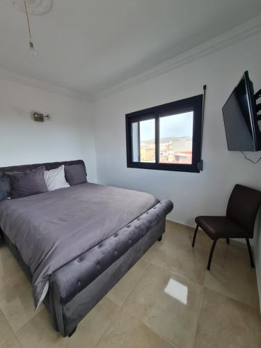 Una cama o camas en una habitación de Jebril palace