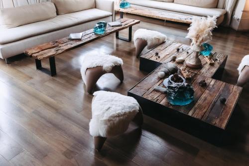 a living room with a couch and a table at Esplendor by Wyndham El Calafate in El Calafate