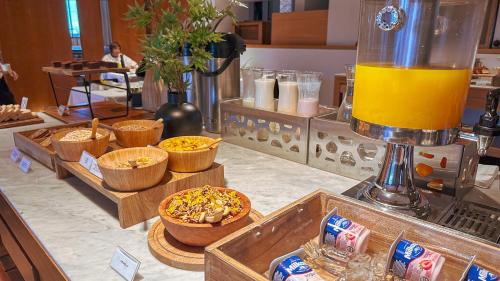 a kitchen counter with bowls of food and a blender at Esplendor by Wyndham El Calafate in El Calafate