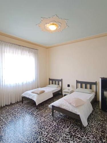 Ένα ή περισσότερα κρεβάτια σε δωμάτιο στο The Country House