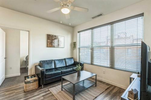 a living room with a couch and a table at Cozy Stay by Clark Fork River and near DT in Missoula