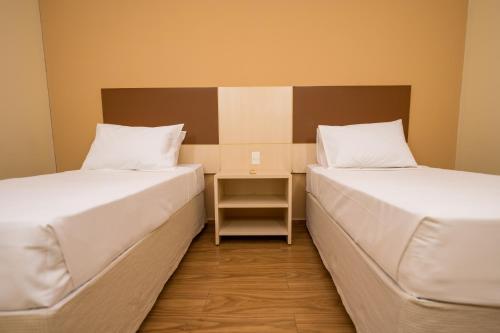 Postel nebo postele na pokoji v ubytování Thermas de Olimpia Resort