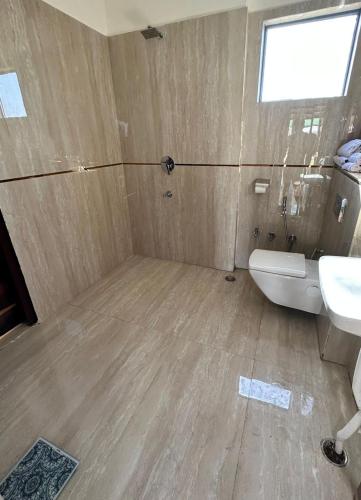 Koupelna v ubytování Laxmi Nursery Jaunti