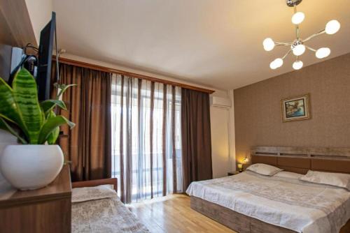 Postel nebo postele na pokoji v ubytování Seasons Boutique Hotel
