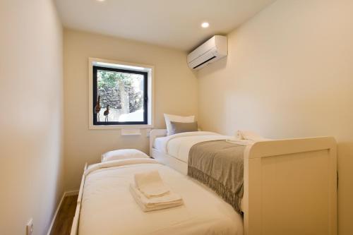 Postel nebo postele na pokoji v ubytování Gabi's House