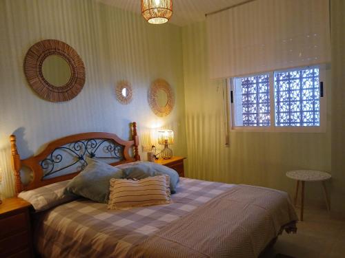 Katil atau katil-katil dalam bilik di Apartamento Paraíso Costero