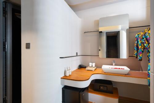 Ένα ή περισσότερα κρεβάτια σε δωμάτιο στο Seaside Boutique Hotel Nha Trang Beach