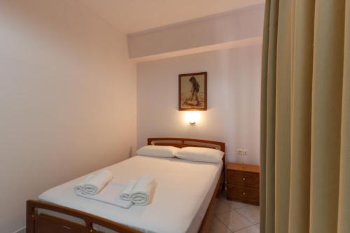 Ліжко або ліжка в номері Hotel Timi