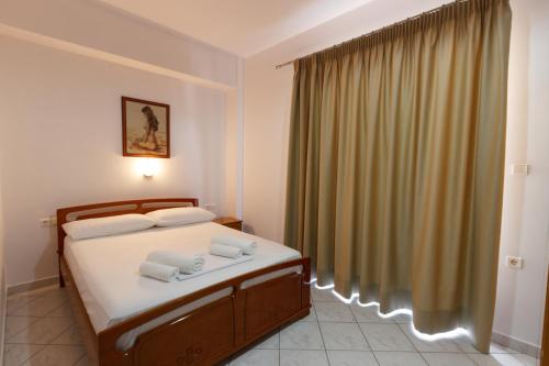 Ліжко або ліжка в номері Hotel Timi