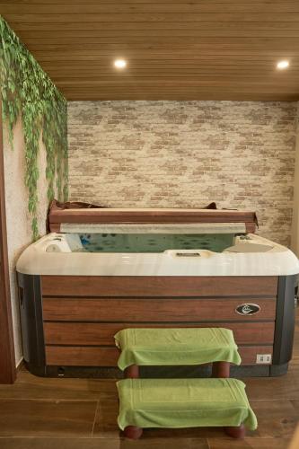 a bathroom with a bath tub with at Vila Vinita in Sveti Jurij ob Ščavnici