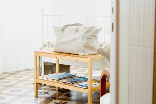 a bag sitting on a table in a room at "Lo Studiolo" in Nardò
